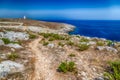 Watch tower on rocky beach