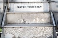 Watch your step sign on stairs Royalty Free Stock Photo