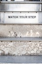 Watch your step sign on stairs Royalty Free Stock Photo