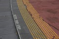 Watch your step sign on stairs with tactile paving Royalty Free Stock Photo