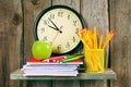 Watches, an apple and school accessories . Royalty Free Stock Photo