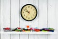 Watches and school tools on a wooden shelf. Royalty Free Stock Photo