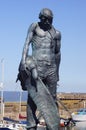 Watchet, UK: bronze statue of the Ancient Mariner at Watchet Harbour Royalty Free Stock Photo