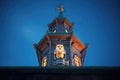 a watchful owl in a moonlit castle belfry Royalty Free Stock Photo