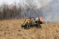 Watching the flames from All Terrain Vehicle Royalty Free Stock Photo