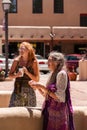 Watching the Hippie Parade in Taos, NM in 2009 Royalty Free Stock Photo
