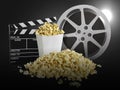 Watching movie with popcorn on black background Royalty Free Stock Photo