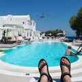 Watching a Plane on Final Approach, Kamari Beach, Santorini Royalty Free Stock Photo