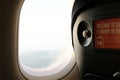 Watching through the plane window. Concept of travel, vacation and adventure. Royalty Free Stock Photo