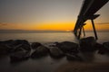 Watching sunrise while I photograph the Pont del Petroli of Badalona Barcelona Spain