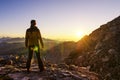 Watching sunrise in the mountains Royalty Free Stock Photo