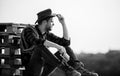 Watching sunset. Farmer cowboy handsome man relaxing after hard working day at ranch. Romanticism western culture Royalty Free Stock Photo