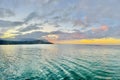 Hanalei Horizon: Sunset Glow and painted clouds over Turquoise Waters