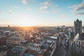 Watching the sunset over Ghent from the historic tower in the city centre. Romantic colours in the sky. Red light illuminating Royalty Free Stock Photo