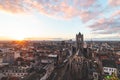 Watching the sunset over Ghent from the historic tower in the city centre. Romantic colours in the sky. Red light illuminating Royalty Free Stock Photo