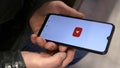 Watching videos from YouTube on a smartphone Royalty Free Stock Photo