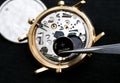 Watchmaker changing battery