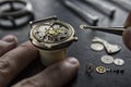 Process of installing a part on a mechanical watch, watch repair Royalty Free Stock Photo