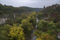 A watchtower above the canyon of the Smotrych River in Kamianets-Podilskyi, Royalty Free Stock Photo