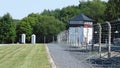 Watchtower and electrified barbed wires in the Buchenwald concentration camp. Weimar, Germany