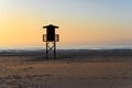 Watchtower silhouette at the beach in Spain