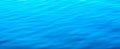 Water abstract background. Blue water ripples texture pattern Royalty Free Stock Photo