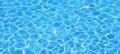 Water background, ripple and flow with waves. Summer blue swiming pool pattern. Sea, ocean surface. Overhead top view with place Royalty Free Stock Photo