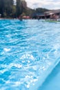 Water background, ripple and flow with waves. Summer blue swiming pool Royalty Free Stock Photo