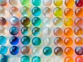 Water beads close-up, abstract background. Texture of glass balls or many colorful for wallpaper. Royalty Free Stock Photo