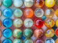 Water beads close-up, abstract background. Texture of glass balls or many colorful for wallpaper. Royalty Free Stock Photo