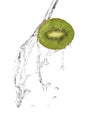 Water being poured in a slice of kiwi isolated Royalty Free Stock Photo
