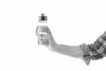 Water is best source of hydration. Water bottle in male hand isolated on white. Satisfying thirst. Healthy water