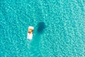 Water bike in turquoise blue sea water aerial view. People have fun, summer day, Greece