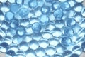 Water blue gel balls. Polymer gel. Silica gel. Balls of blue hydrogel. Crystal liquid ball with reflection. Texture background. Royalty Free Stock Photo