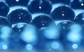 Water blue gel balls. Polymer gel. Silica gel. Balls of blue hydrogel. Crystal liquid ball with reflection. Texture background. Royalty Free Stock Photo