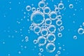 Water blue structure. Bubbles of oxygen under water. Macro Royalty Free Stock Photo