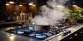 Water Boiling Stainless pot on a gas stove in a modern kitchen, Steaming and boiling pan of water Royalty Free Stock Photo