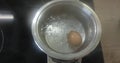 Water boils in a saucepan on an induction hob