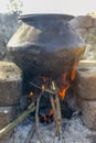 Water boils in a traditional brick stove