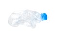 Water bottle crushed crumpled on the white background Royalty Free Stock Photo