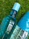 Water bottle on green grass as background Royalty Free Stock Photo