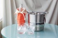 Water bottle and ice water with stainless bucket Royalty Free Stock Photo