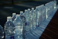 water bottles lined up by sidelines Royalty Free Stock Photo