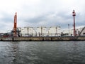 Water-bound petrochemical terminal with numerous tanks and with Royalty Free Stock Photo