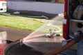 Water breakthrough in the fire hose Royalty Free Stock Photo