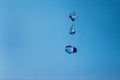 Water bubbles in the blue sky. Water drops on blue background. Aqua, rain, weather, clear. Life, freedom, ease Royalty Free Stock Photo