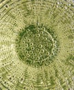 Water bubbles inside a glass, sparkling drink