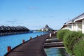 Water bungalows and blue ocean and sunny sky