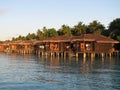 Water bungalows at sunset