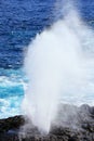 Water bursts through blowhole on Espanola Island, Galapagos National park, Ecuador